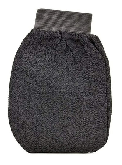 Compact folded black exfoliating kessa scrub mitt with elastic wrist band for easy storage