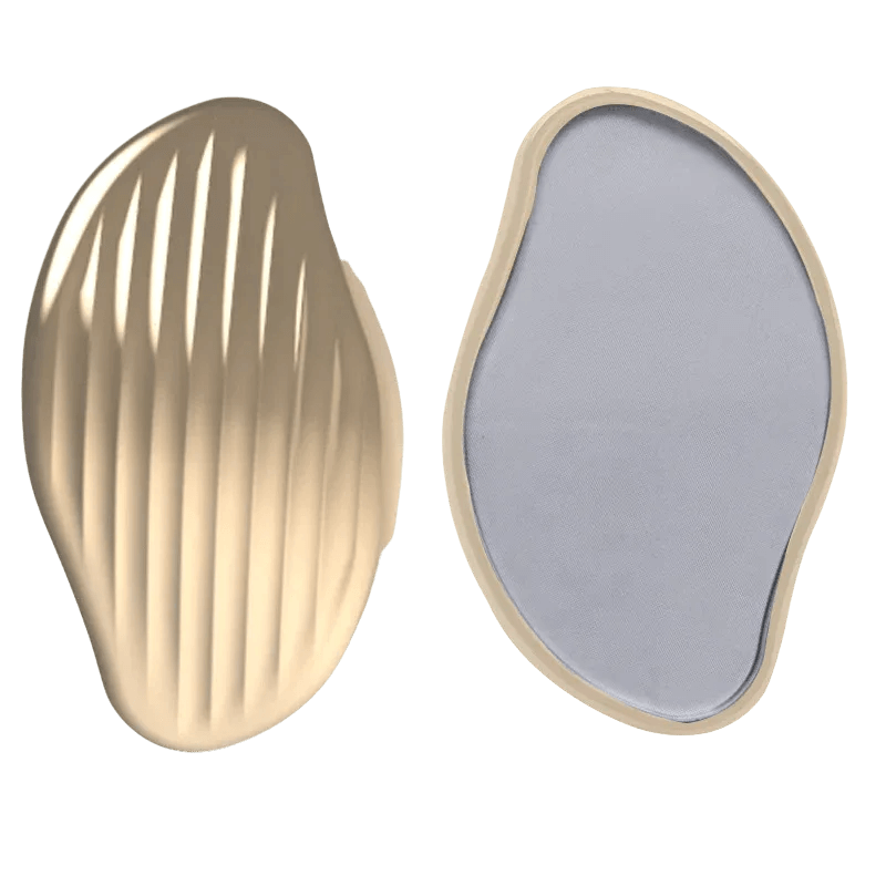 Gold nano glass hair eraser showing textured exfoliating side and smooth crystal surface for painless hair removal